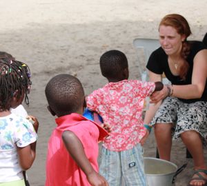 photo courtesy of the Traveling School, volunteering in a school