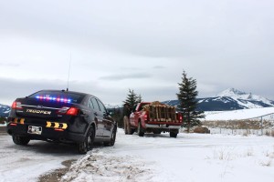 Montana Highway Patrol Trooper Brad Moore stops a speeding driver on MT 64 bound for the Yellowstone Club on Dec. 2. PHOTO BY AMANDA EGGERT