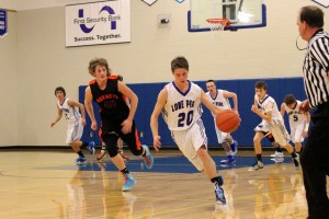 Sophomore guard Liam Germain snags a steal and heads down court for a layup during the Big Horns' Feb 6 69-61 loss to White Sulphur Springs.