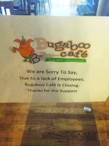Bugaboo Café owner Geoff Calef posted this sign on its front door in late July. PHOTO BY ERSIN OZER
