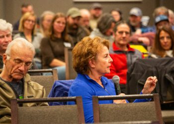 Part-time resident Linda Martinez shares personal experience leading an incorporation effort in Arizona, during Tuesday's meeting held by Big Sky Governance Study. PHOTO BY JACK REANEY